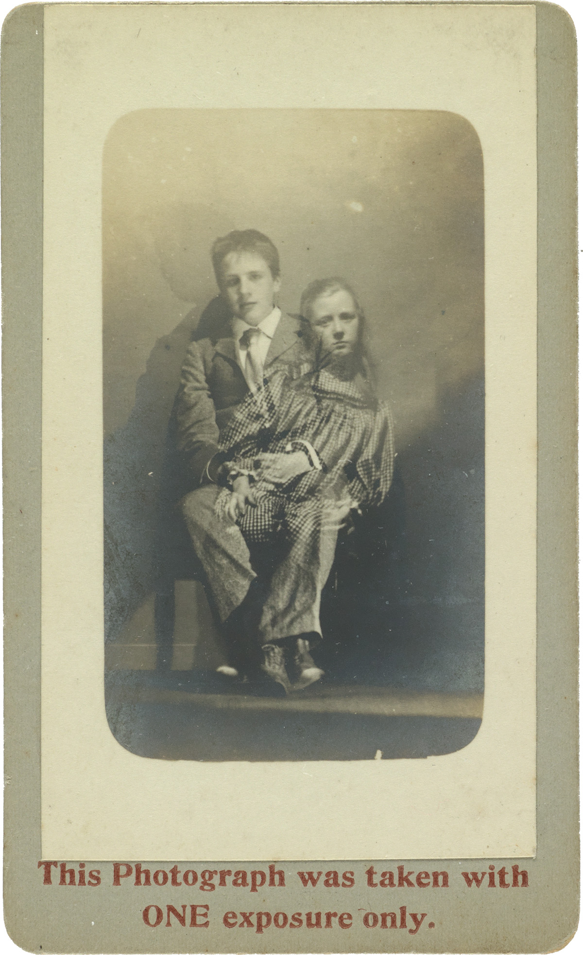 (CREWE CIRCLE--WILLIAM HOPE & WILLIAM WALKER) A pair of spirit photographs, each showing the ghost of Margery Walker and her brother.